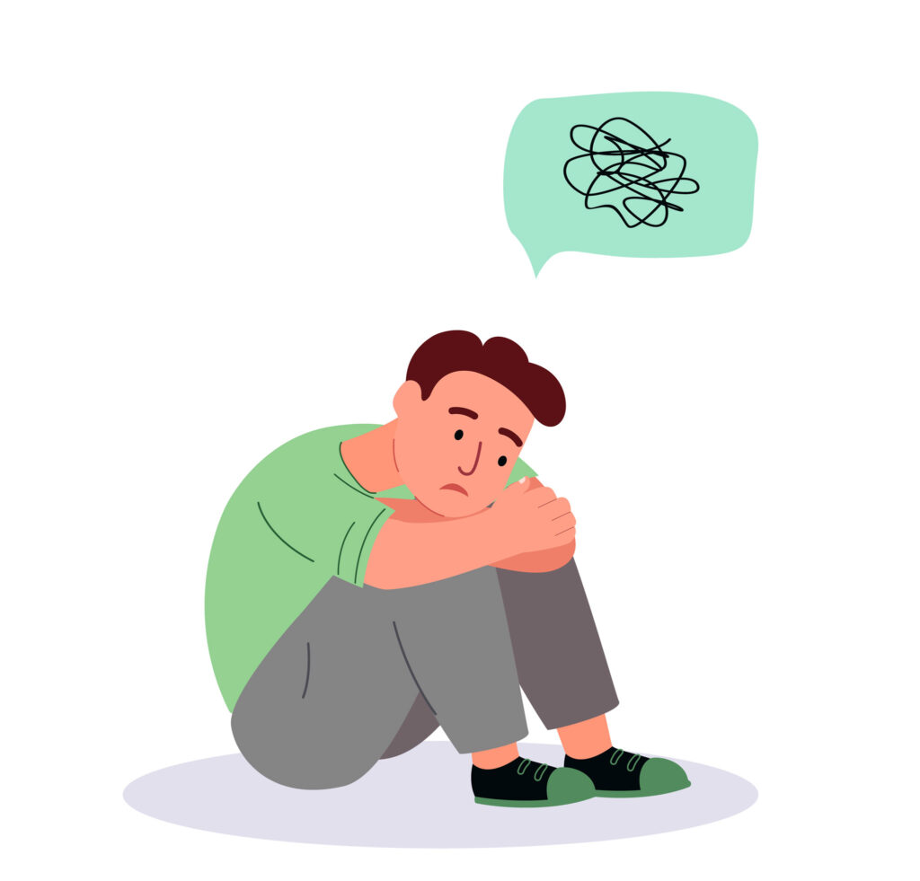 illustration of a man sitting and grabbing his knees, needing to see a mental health professional