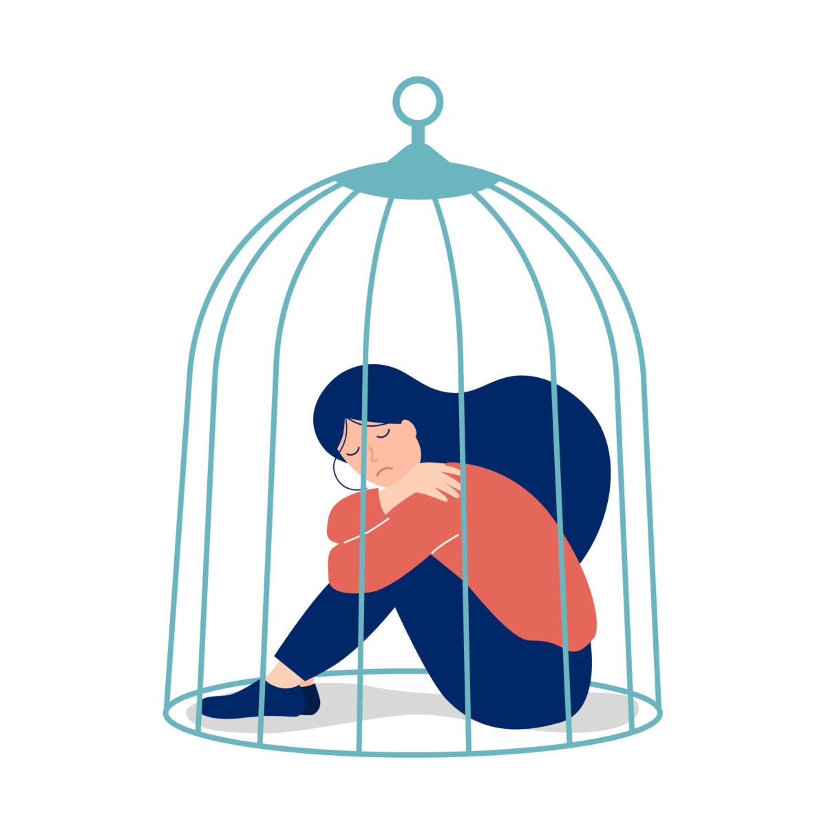 Sad girl sitting in a cage isolated on white background. Depression and self-isolation concept.