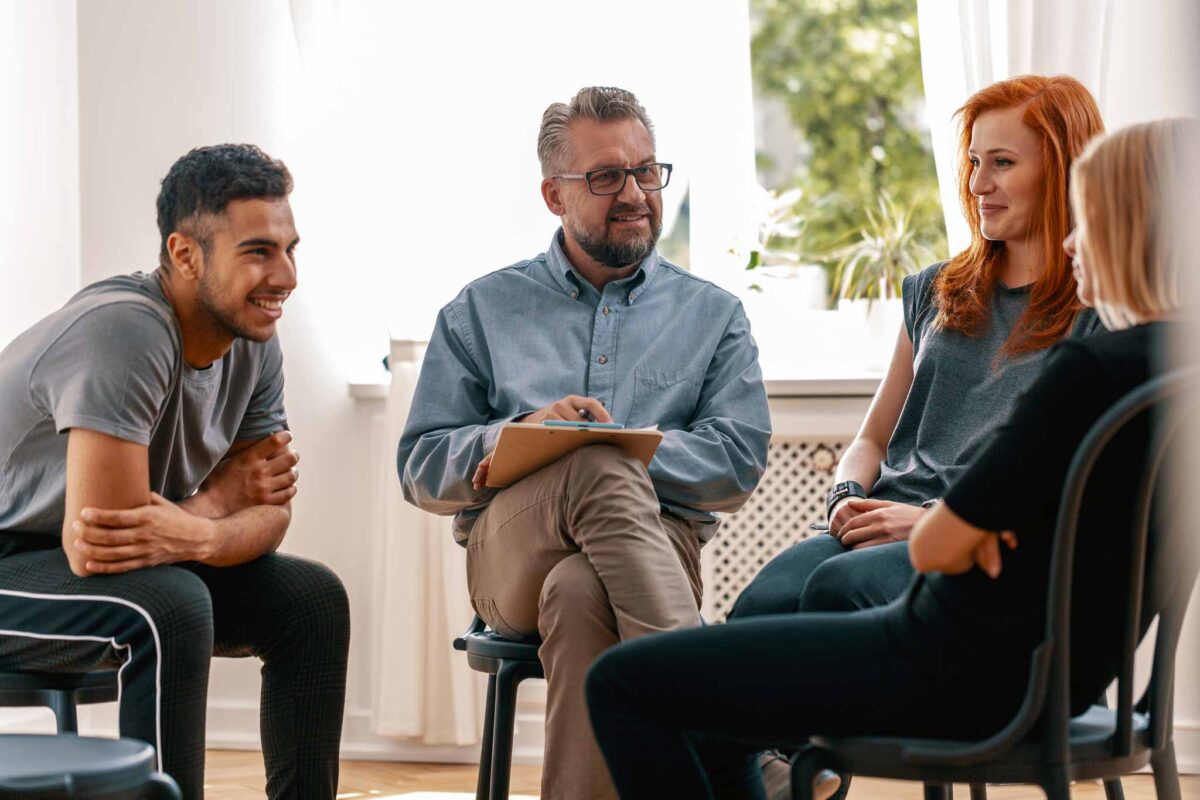image of a session in group therapy for addiction treatment