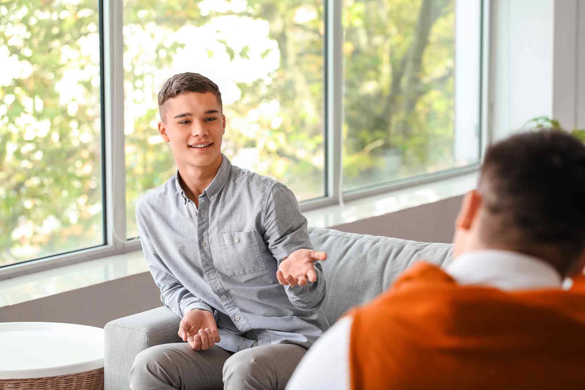 image of a therapy session and the teen client is talking about school issues